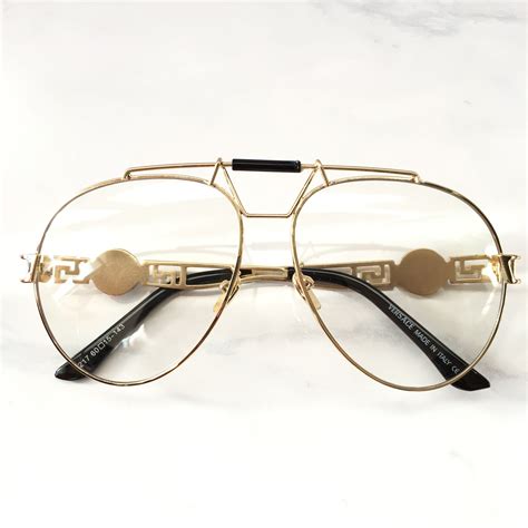 clear and Gold Versace glasses